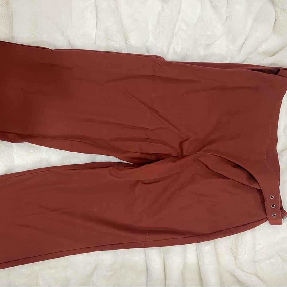 Pants with belt attached